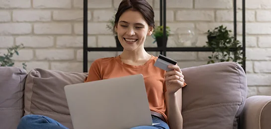Lady applying for a credit card online.