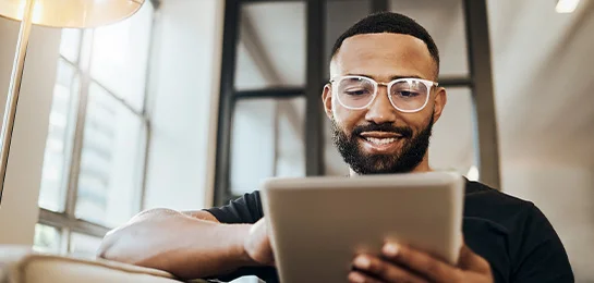 A man applying for a mortgage online.