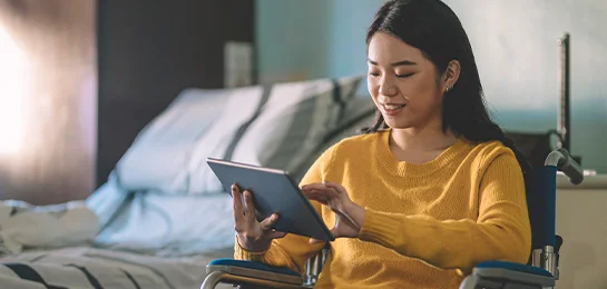 Women banking on her tablet.